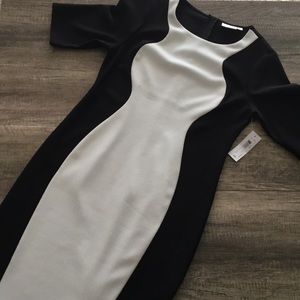 Black and white body con dress; knee length